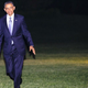 President Barack Obama returns from fundraisers in New York City. (Pool/Getty Images News)